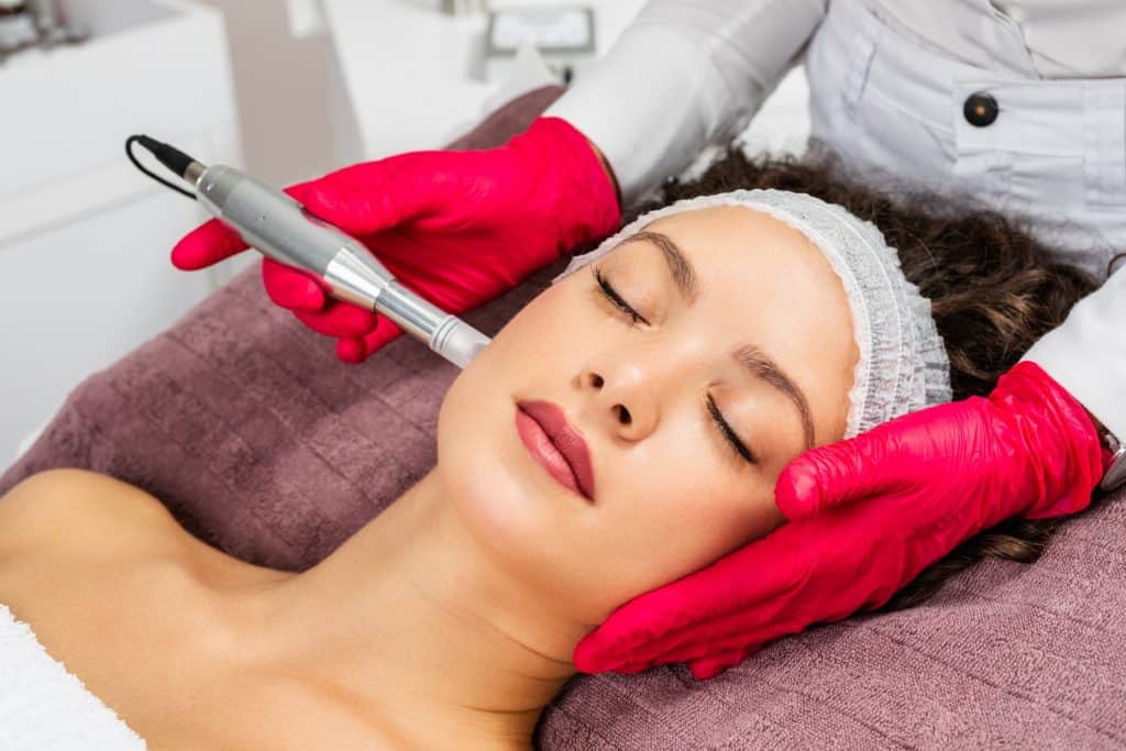 Beautiful Woman Receiving Microneedling Rejuvenation Treatment | Homa Rejuvenation Center in Oviedo, FL