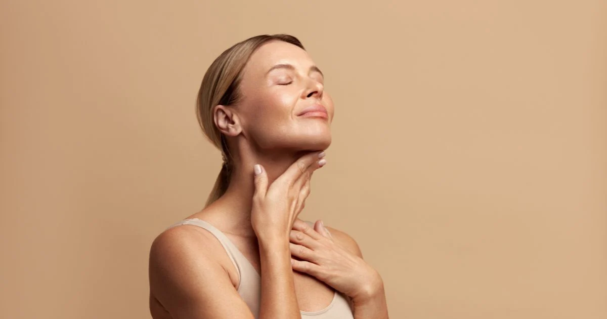 Close-up of Kybella injections being administered for non-surgical fat reduction under the chin.