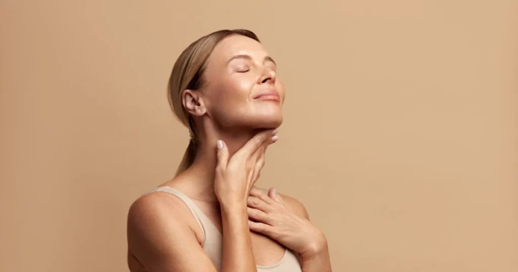 Close-up of Kybella injections being administered for non-surgical fat reduction under the chin.